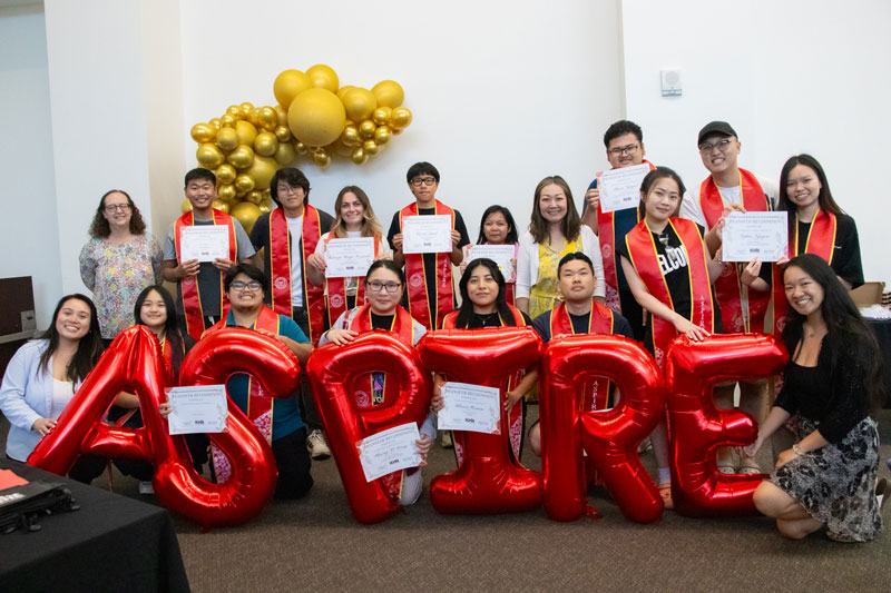 Aspire Graduation behind Aspire balloons