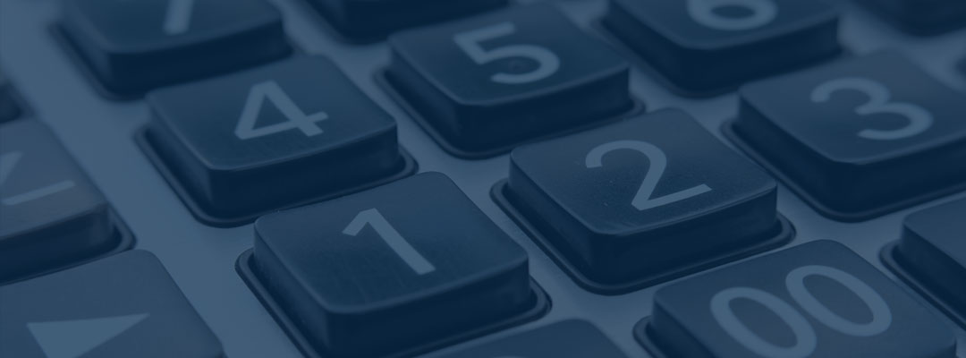 Close-up of a calculator keypad with large number buttons in blue tones.